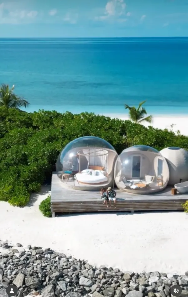 Golden-hour couple shoot at a luxury Maldives resort